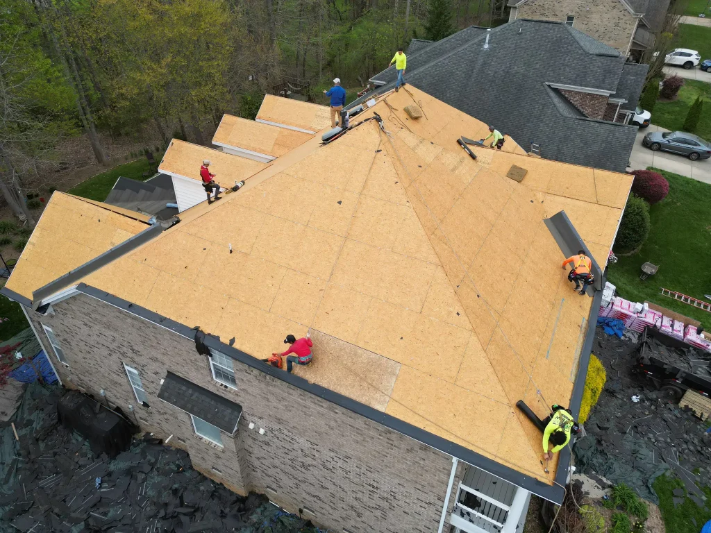 Asphalt shingle tear-off during a roof replacement in Waxhaw, NC